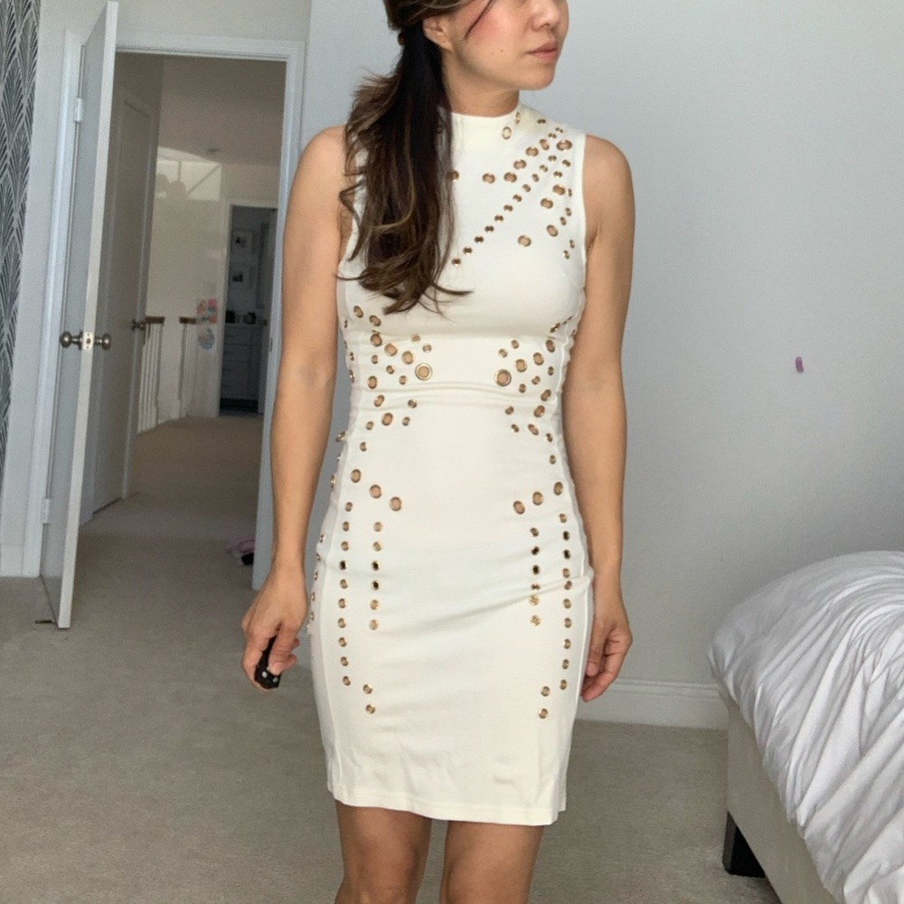 Never worn tight white dress with gold details